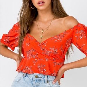 Orange floral crop top from Princess Polly